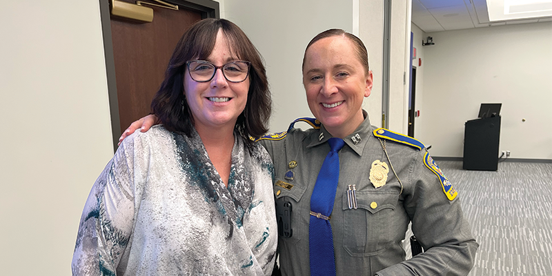 Human Trafficking prevention experts Tammy Sneed and Captain Conley pose for a photo.