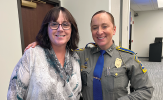 Human Trafficking prevention experts Tammy Sneed and Captain Conley pose for a photo.